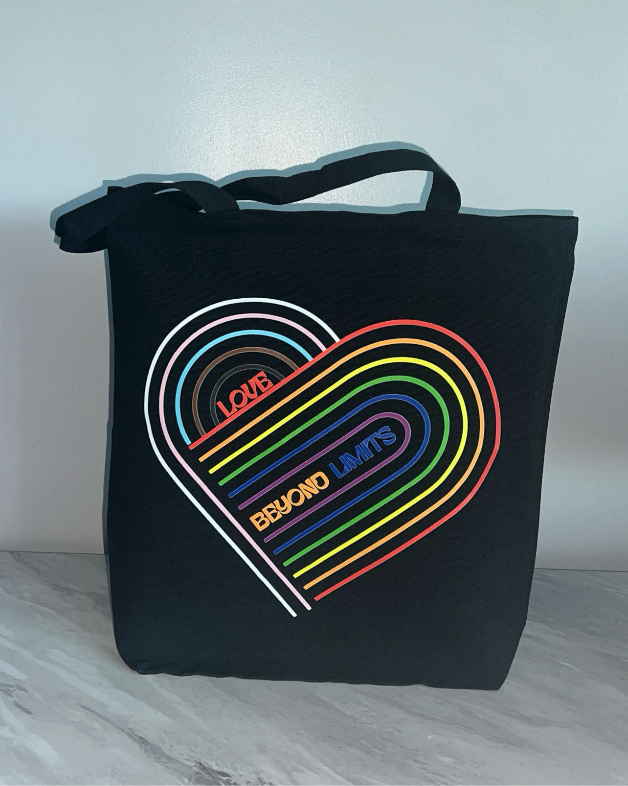 LOVE BEYOND LIMITS TOTE BAG