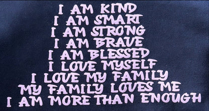 Close up affirmation sleeve for kindness hoodie